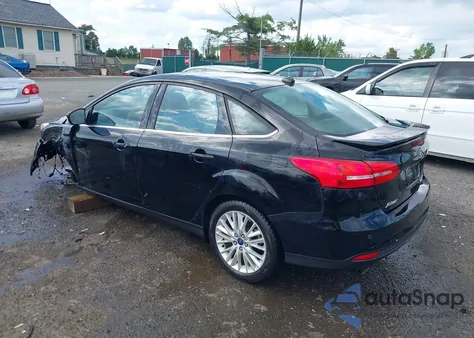 2016 Ford Focus Titanium z USA, uszkodzony, nr VIN 1FADP3J27GL215436